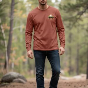 Model wearing Colorado Mountain Brewery long-sleeve shirt in brick red – front view.