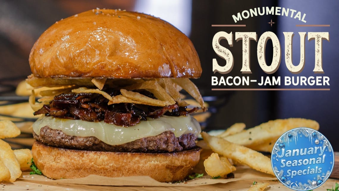 Monumental Stout Bacon-Jam Burger with melted white cheddar, crispy onion strings, and crinkle-cut fries - January seasonal special at Colorado Mountain Brewery in Colorado Springs